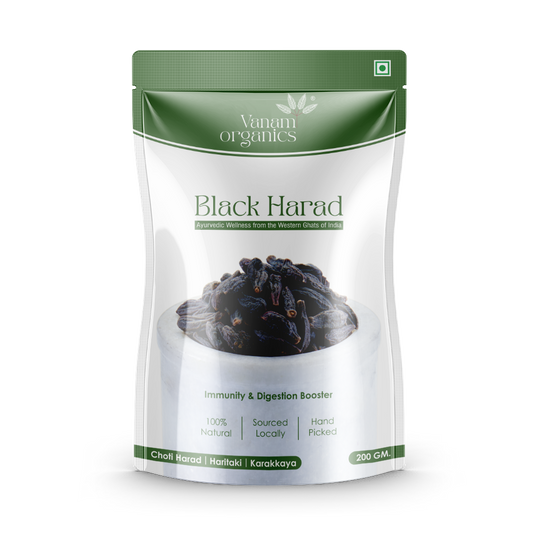 A 200g stand-up pouch of Vanum Organics Black Harad, featuring a white and dark green design with a photo of dried black harad berries in a bowl.